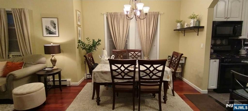 40 Eckel Road Little Ferry, NJ 07643 - Photo 6 of 21 a view of a dining room with furniture and a kitchen