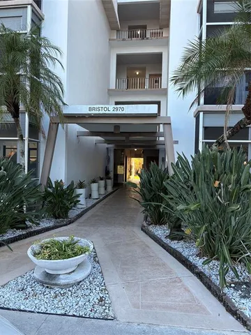 a view of house with outdoor space and entertaining space