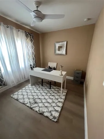 a living room with a couch and a table