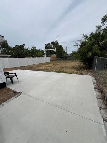 a view of a terrace with a lake view