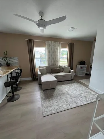 a living room with furniture and a couch