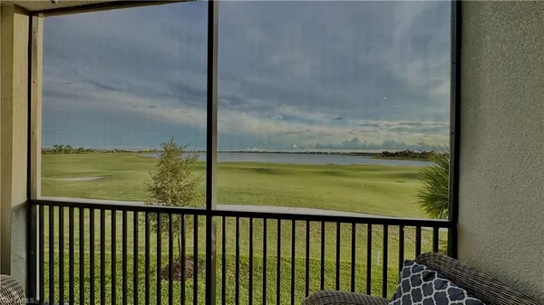 a view of a balcony with an ocean view