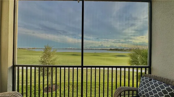 a view of a balcony with an ocean view