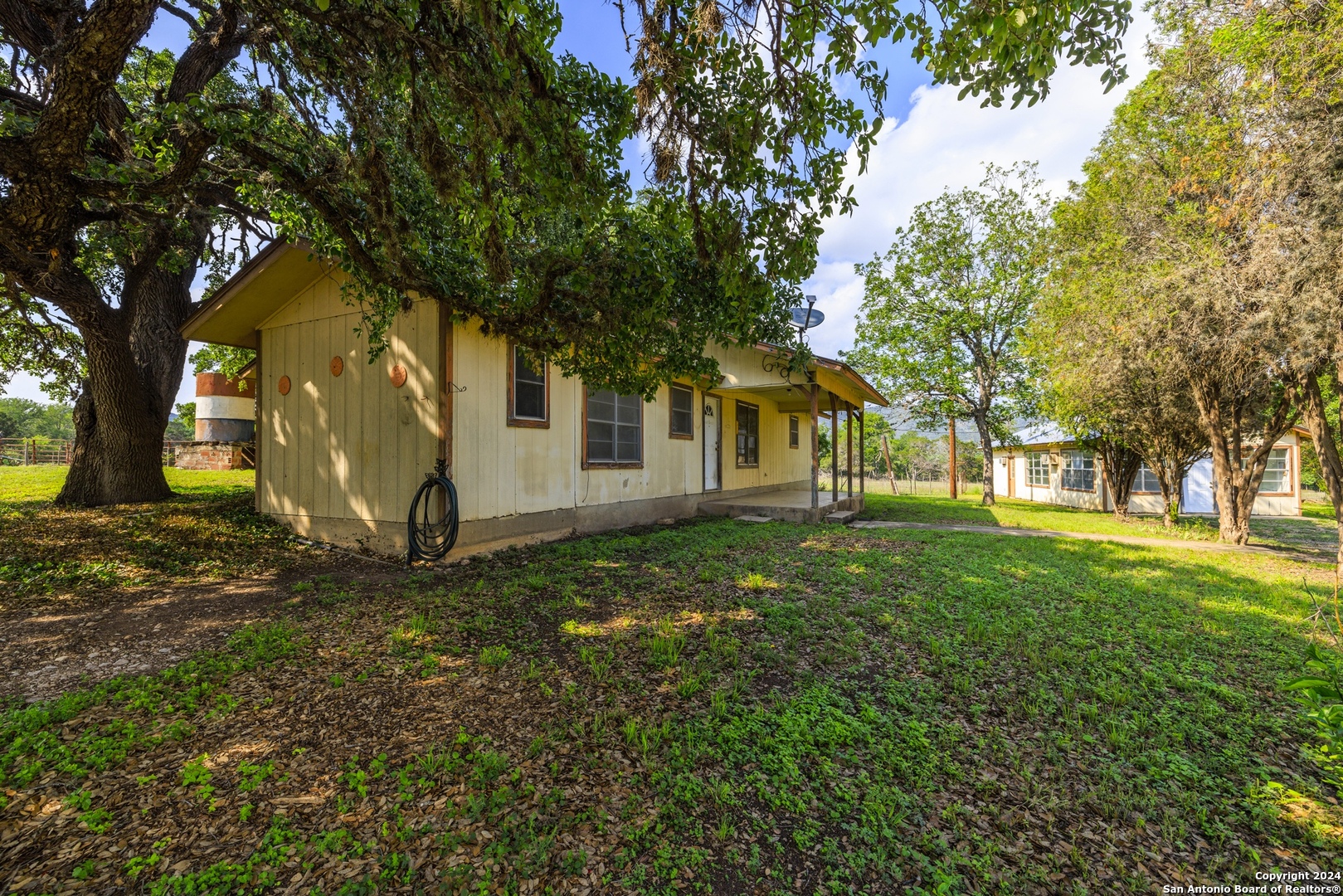 75 Rm 366 Leakey, TX 78873 - Photo 21 of 49 a view of a tree in front of a house