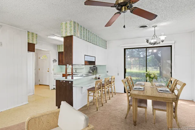 a bedroom with a bed and couch