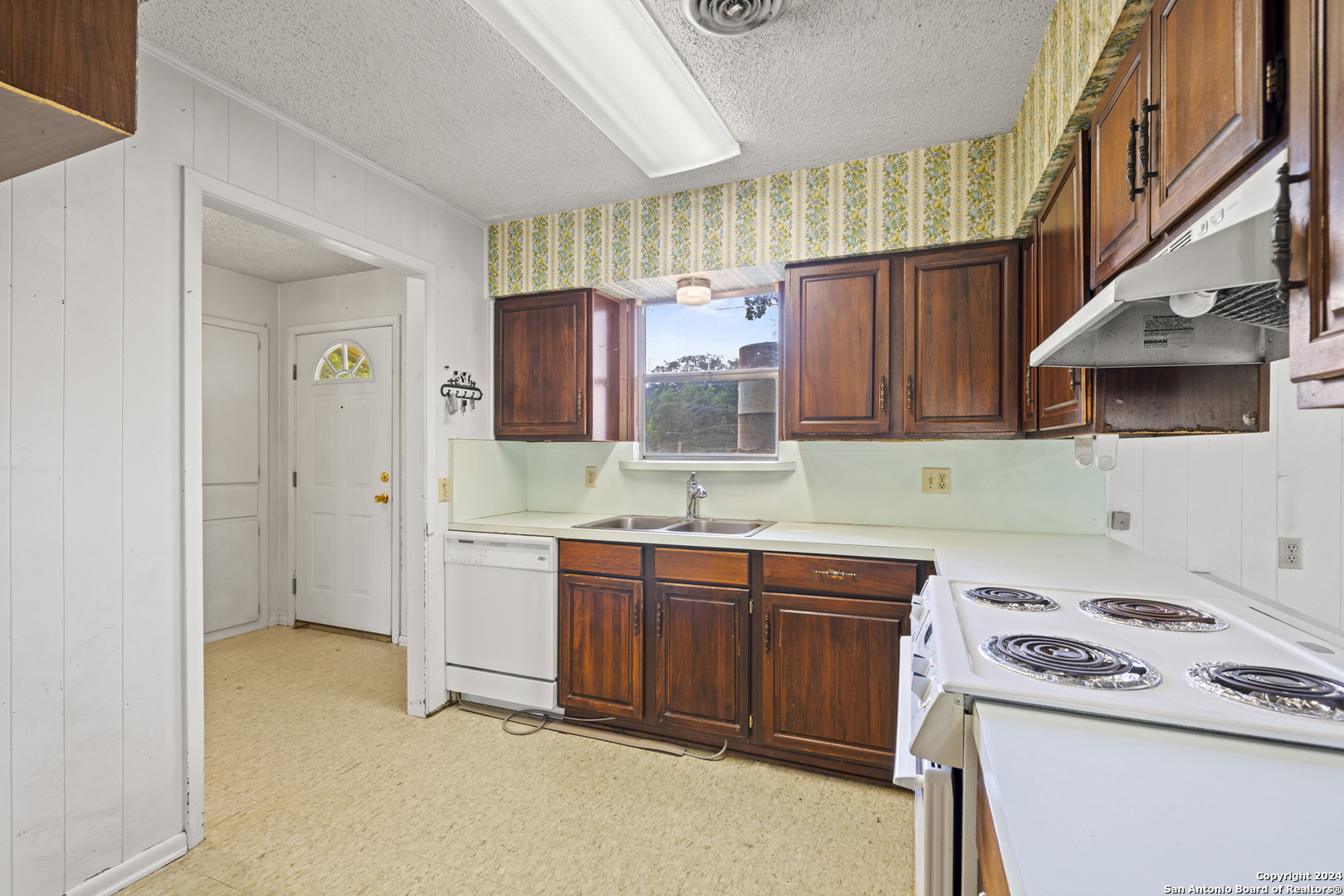75 Rm 366 Leakey, TX 78873 - Photo 27 of 49 a kitchen that has a sink and a stove in it
