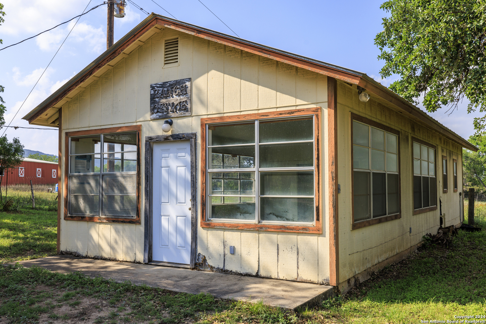75 Rm 366 Leakey, TX 78873 - Photo 36 of 49 a front view of a house with a yard