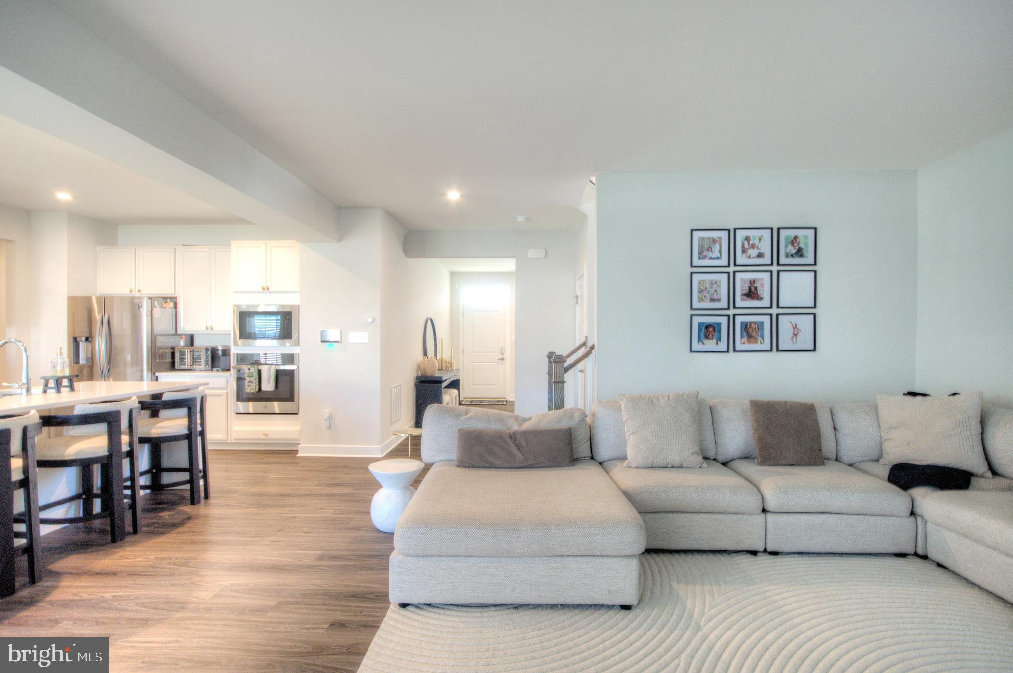 8 Eichmann Way Woodstown, NJ 08098 - Photo 12 of 47 a living room with furniture and wooden floor