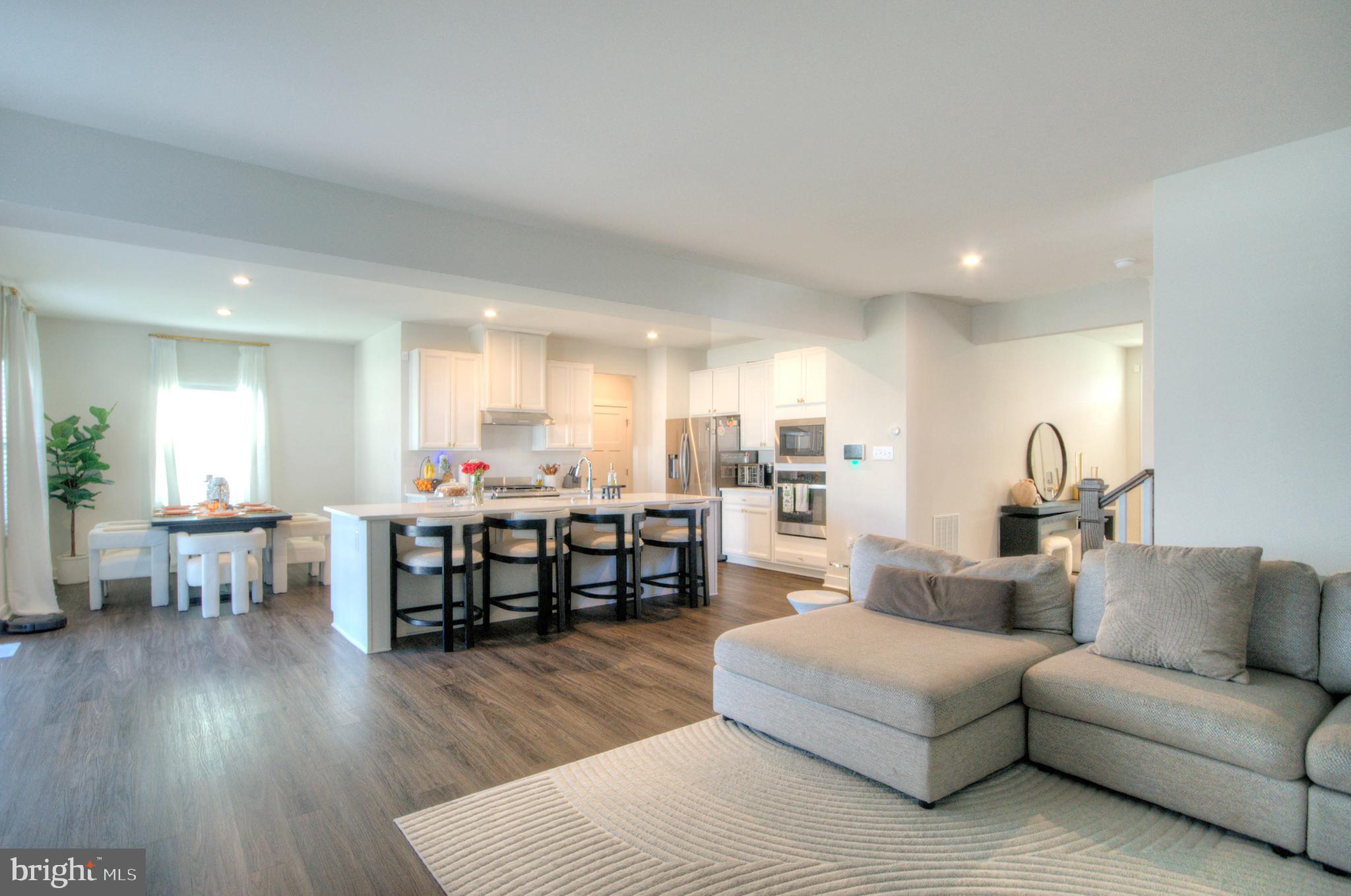 8 Eichmann Way Woodstown, NJ 08098 - Photo 13 of 47 a living room with furniture and a wooden floor