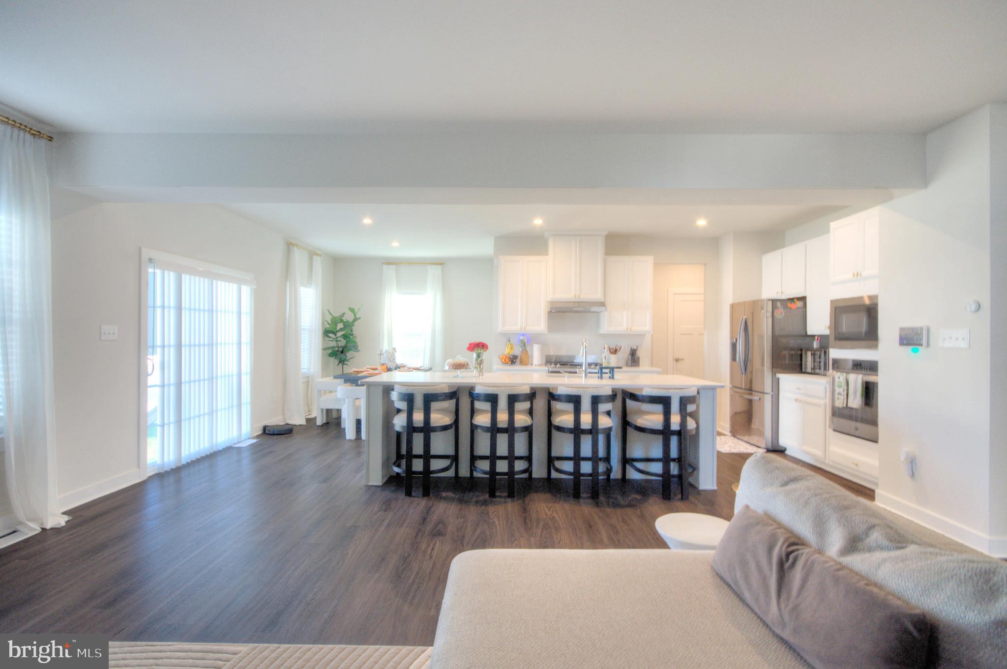 8 Eichmann Way Woodstown, NJ 08098 - Photo 14 of 47 a dining room with furniture and wooden floor