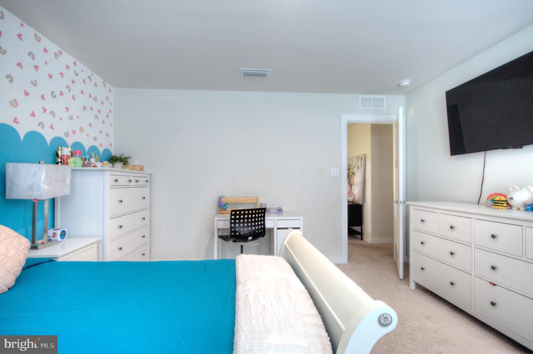 8 Eichmann Way Woodstown, NJ 08098 - Photo 19 of 47 a living room with furniture and a flat screen tv