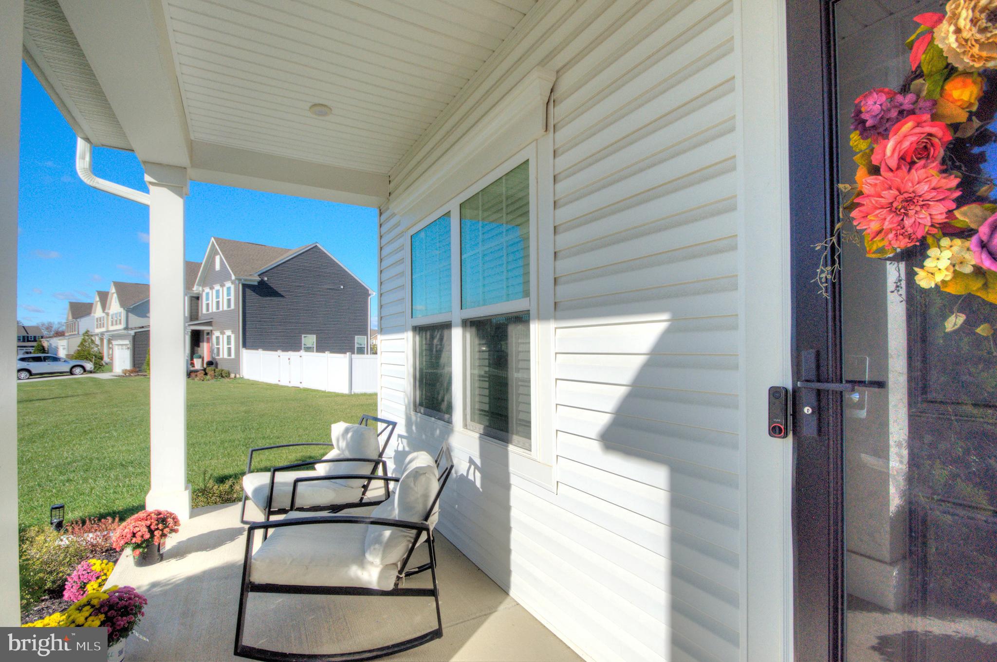 8 Eichmann Way Woodstown, NJ 08098 - Photo 2 of 47 a backyard of a house with outdoor seating