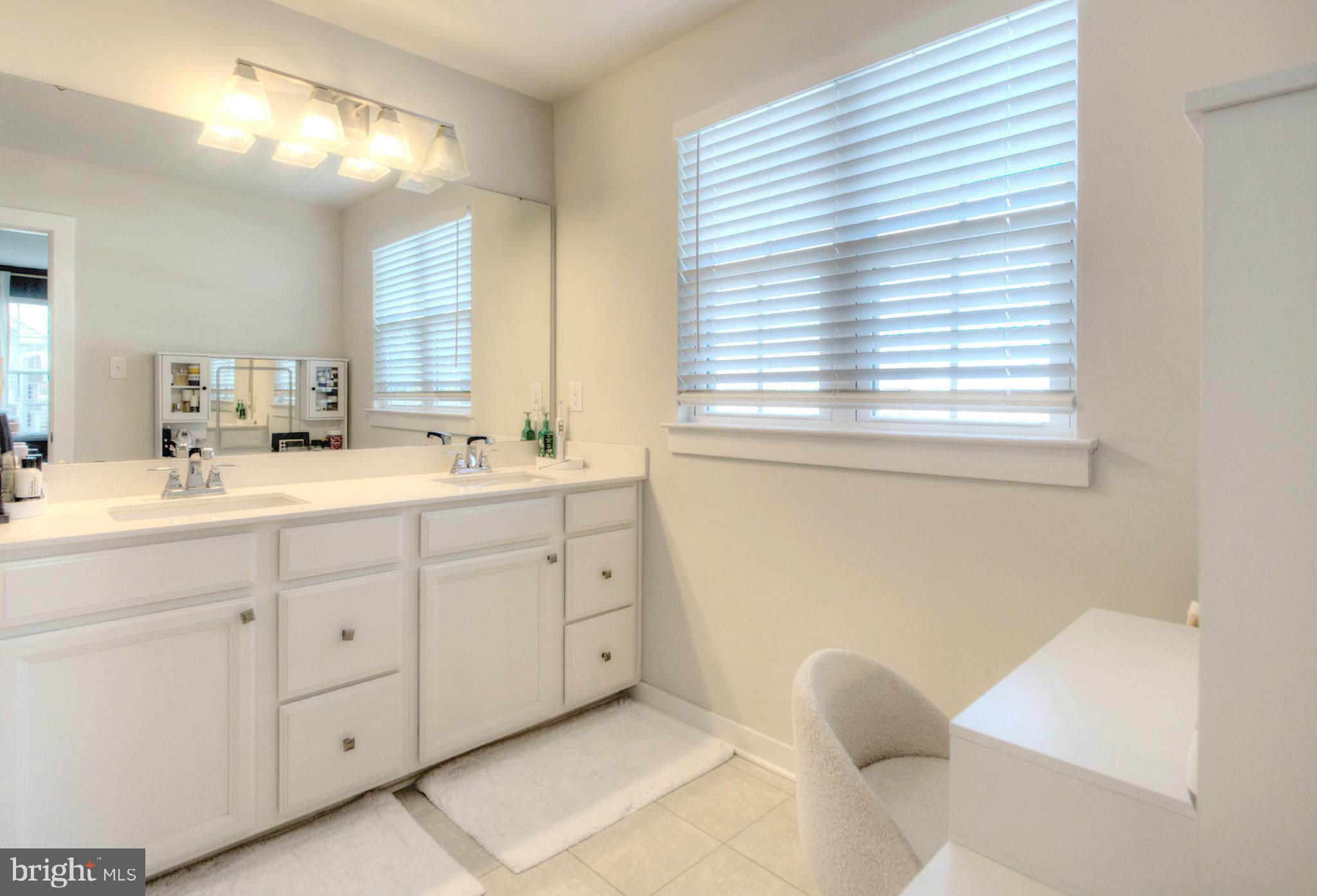 8 Eichmann Way Woodstown, NJ 08098 - Photo 30 of 47 a spacious bathroom with a double vanity sink mirror and a