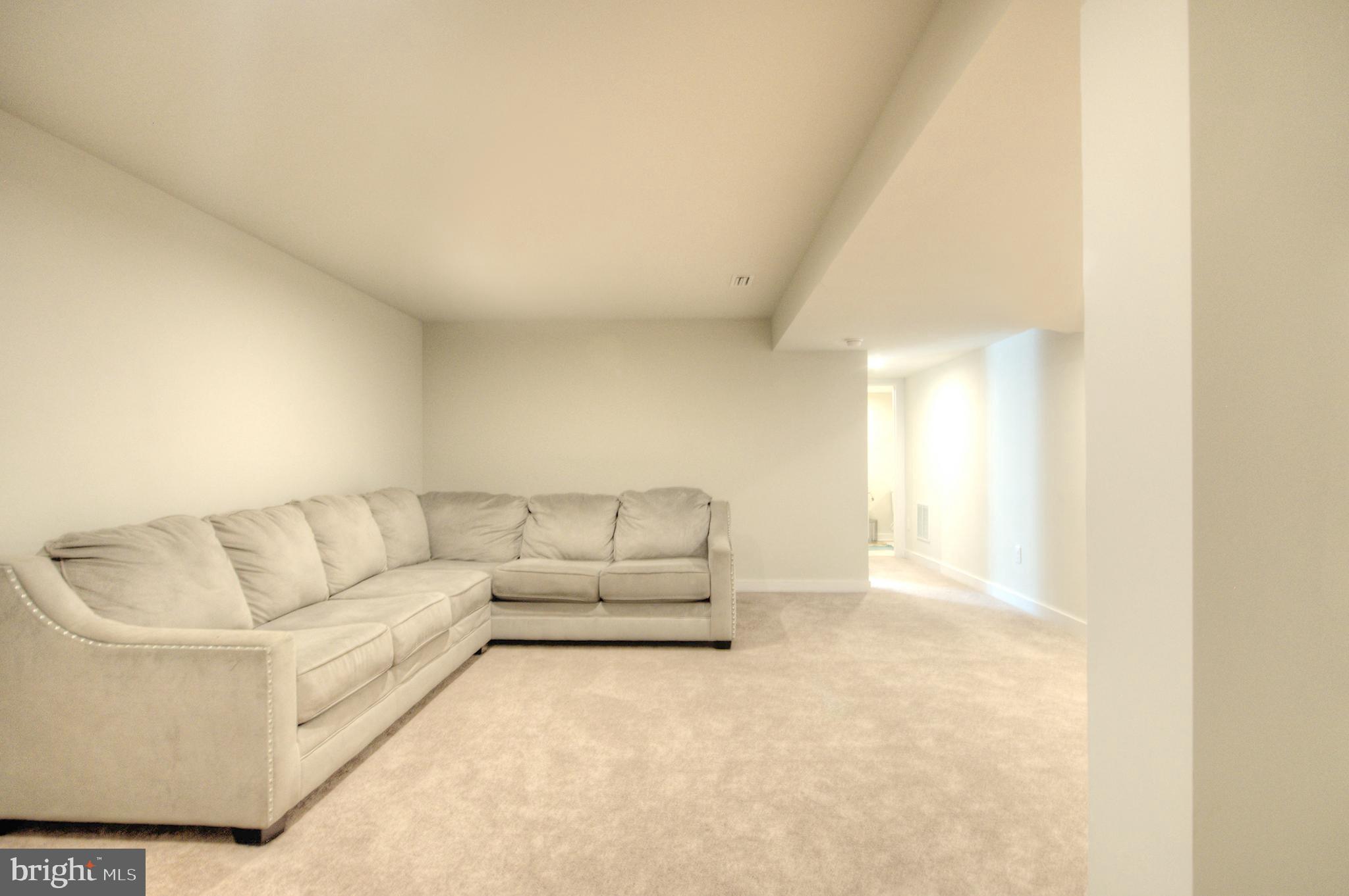 8 Eichmann Way Woodstown, NJ 08098 - Photo 32 of 47 a living room with furniture and white walls
