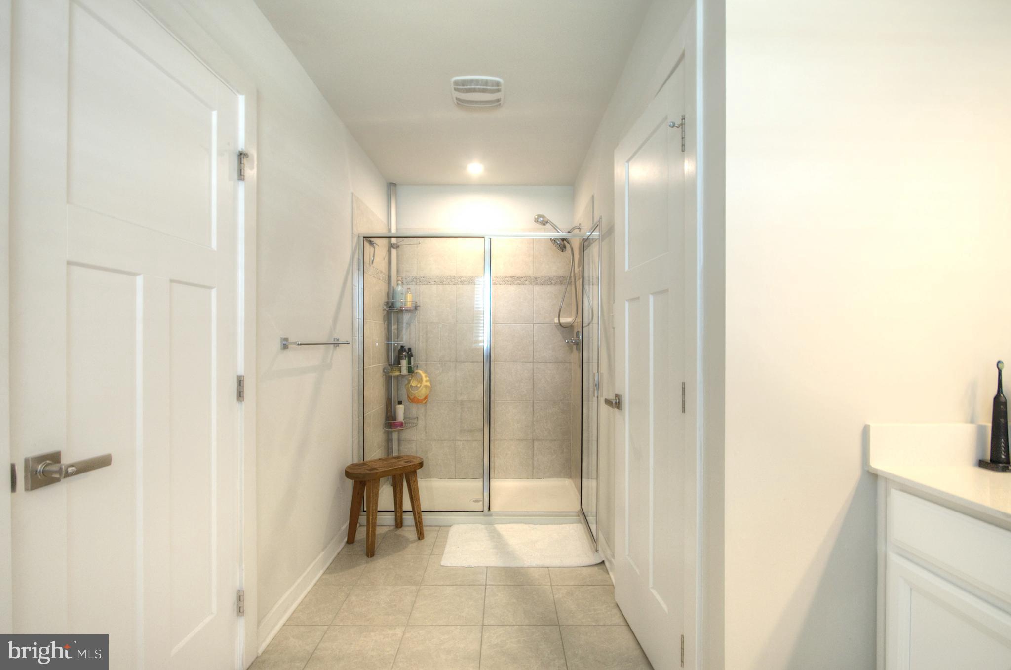 8 Eichmann Way Woodstown, NJ 08098 - Photo 45 of 47 a bathroom with a glass shower door
