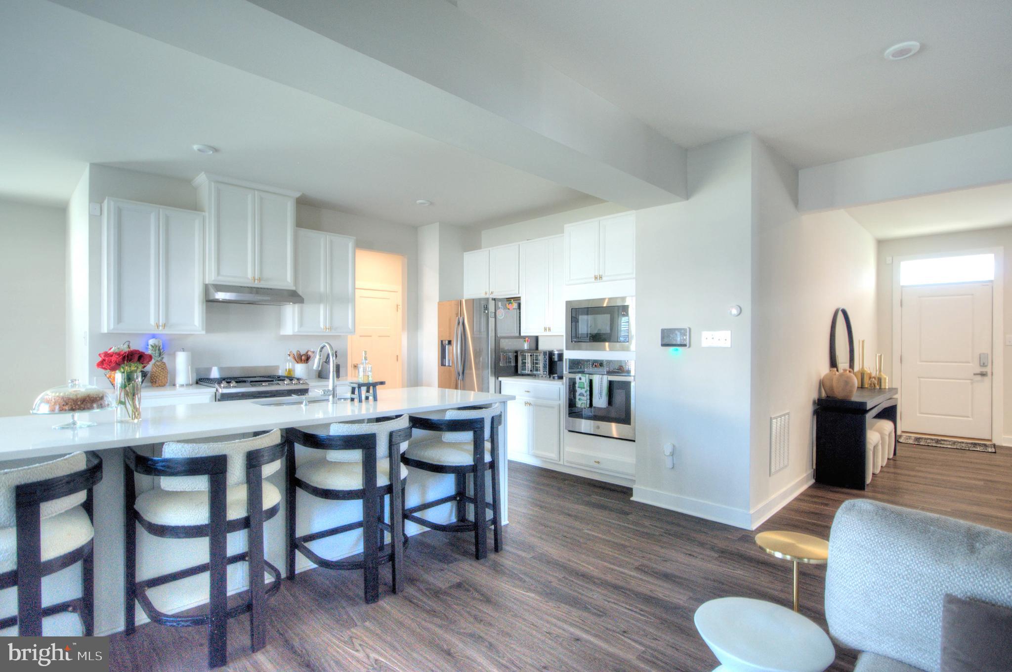 8 Eichmann Way Woodstown, NJ 08098 - Photo 5 of 47 a view of a dining room with furniture and wooden floor