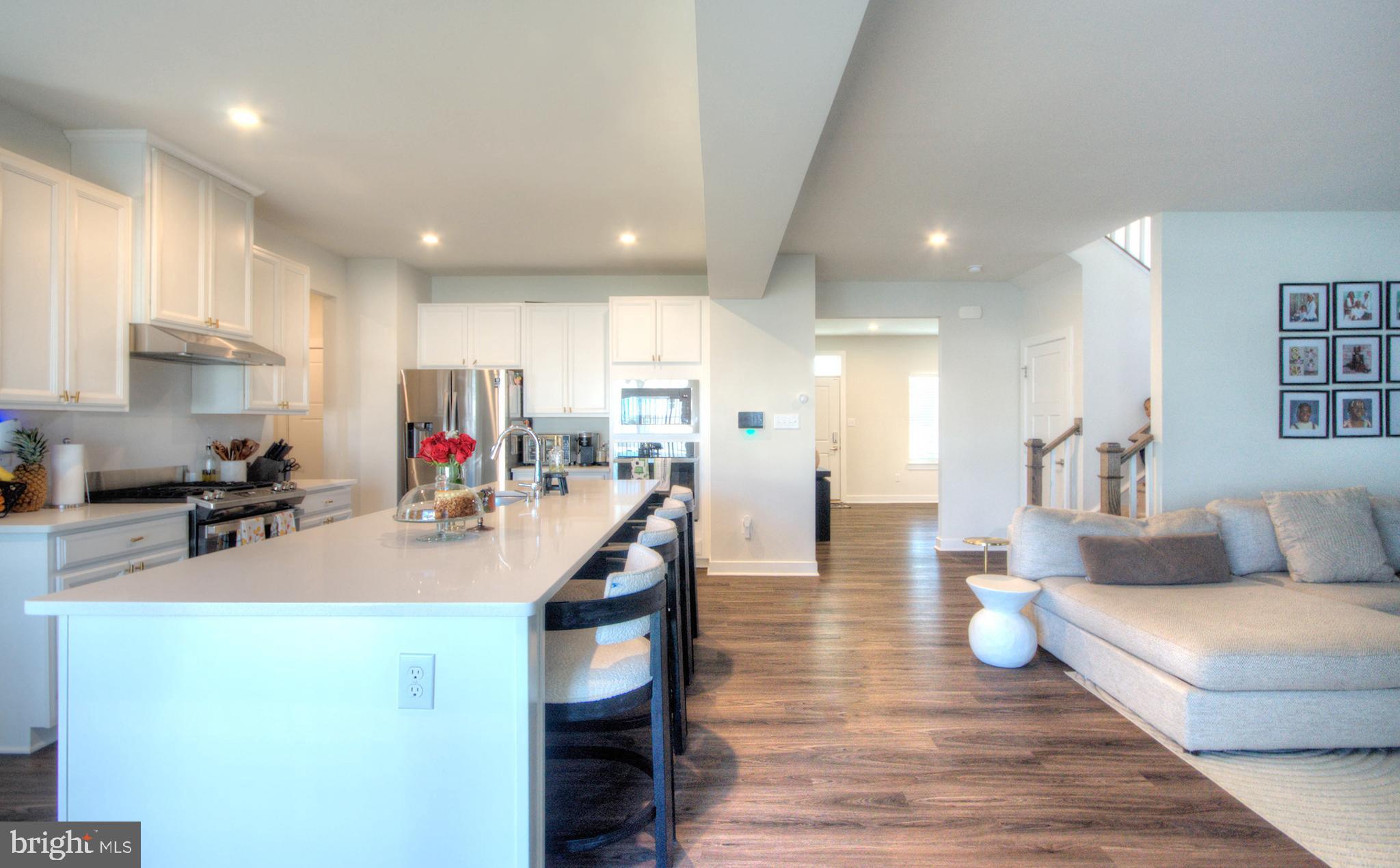 8 Eichmann Way Woodstown, NJ 08098 - Photo 9 of 47 a living room with furniture and kitchen view