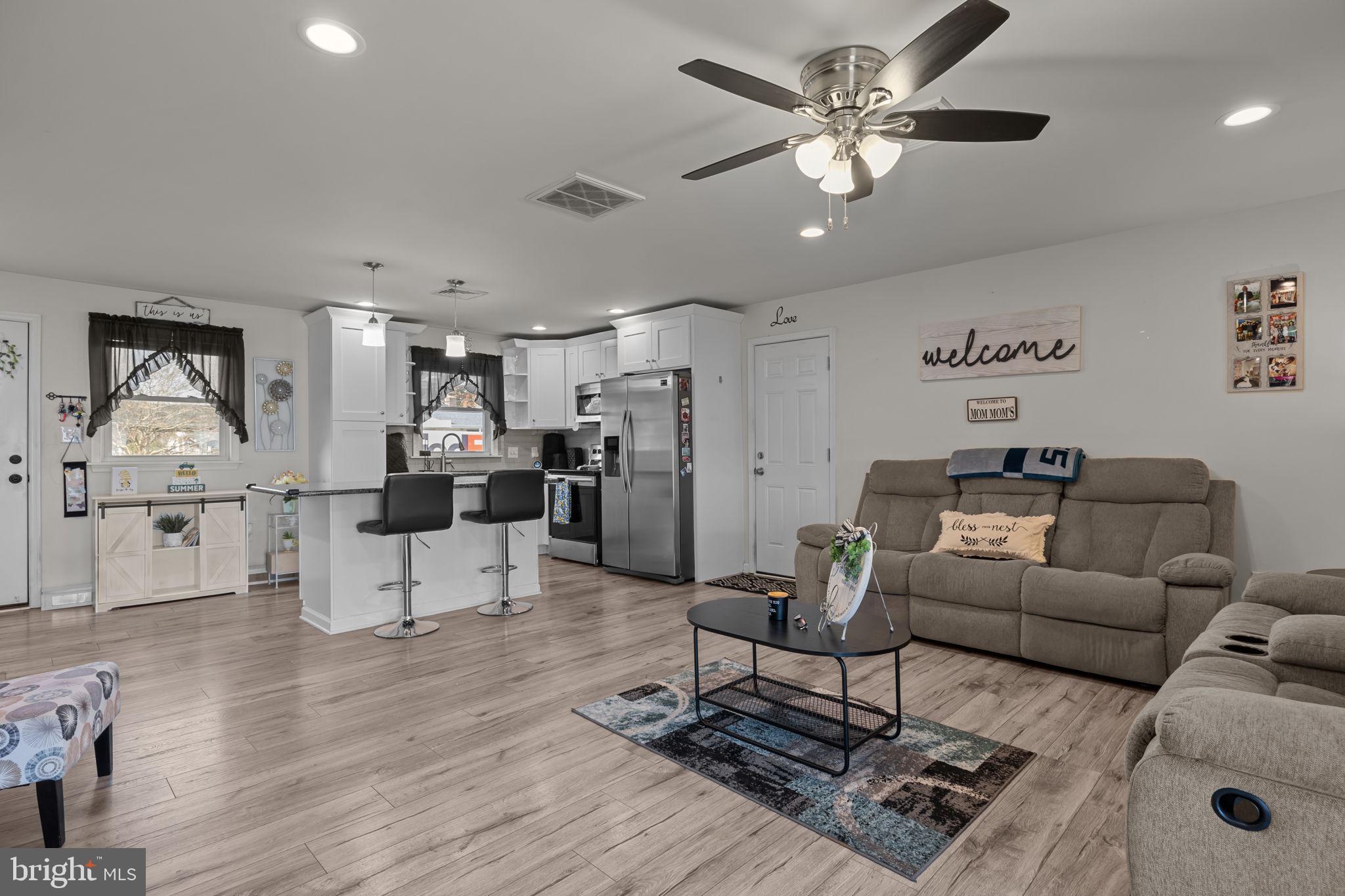 179 Crabtree Drive Levittown, PA 19055 - Photo 12 of 25 a living room with furniture and view of kitchen