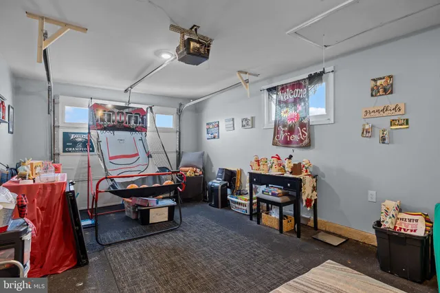 a room with furniture and musical instruments