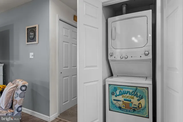 a bathroom with a shower a toilet and a sink