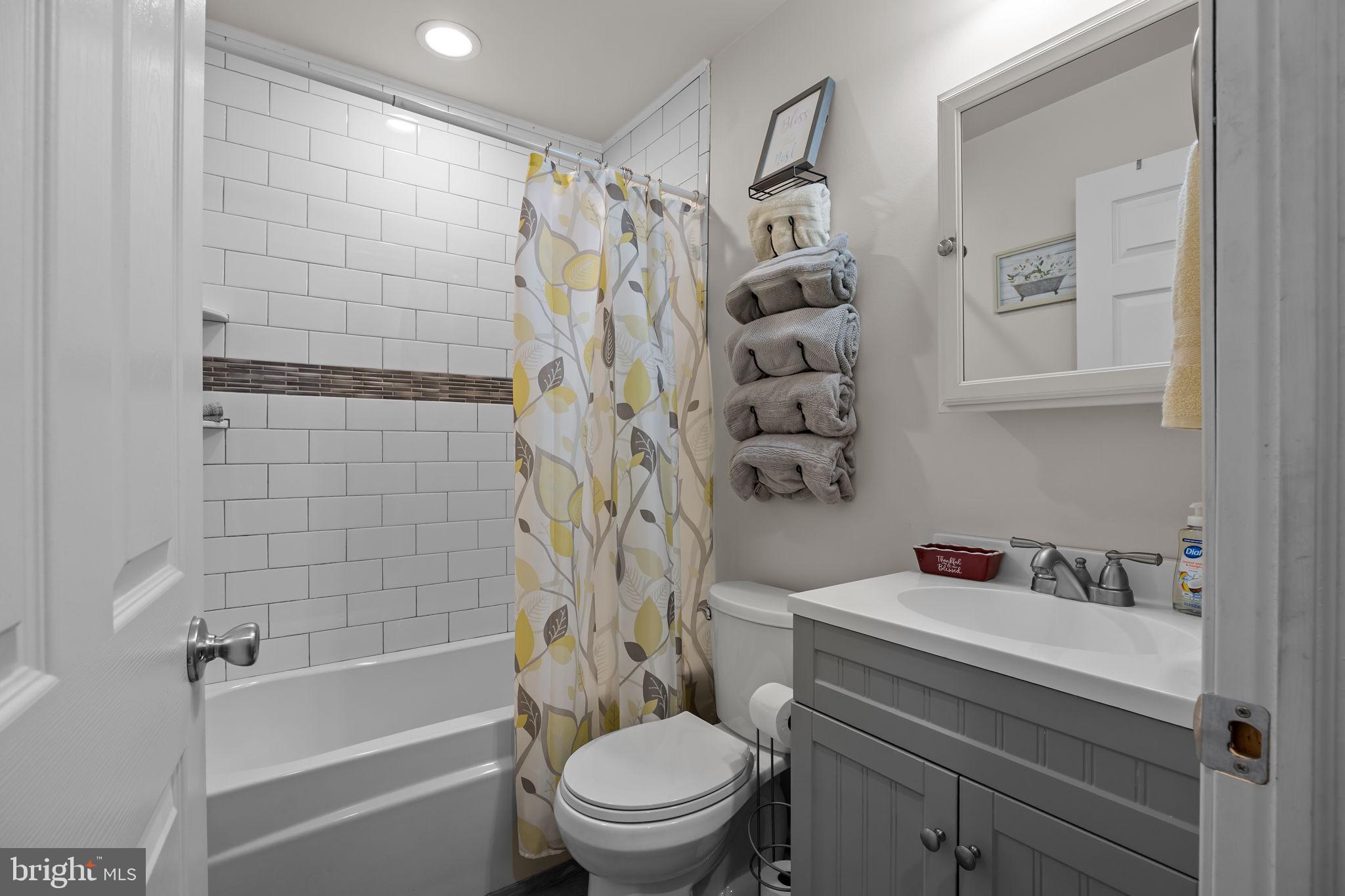 179 Crabtree Drive Levittown, PA 19055 - Photo 16 of 25 a bathroom with a shower a toilet and a sink