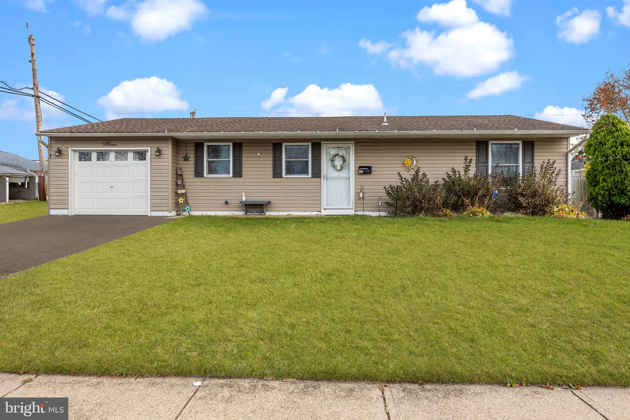 179 Crabtree Drive Levittown, PA 19055 - Photo 2 of 25 a view of a yard in front of a house
