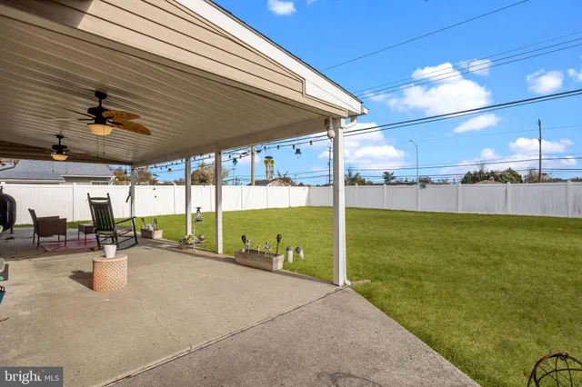 a view of a swimming pool and an outdoor space