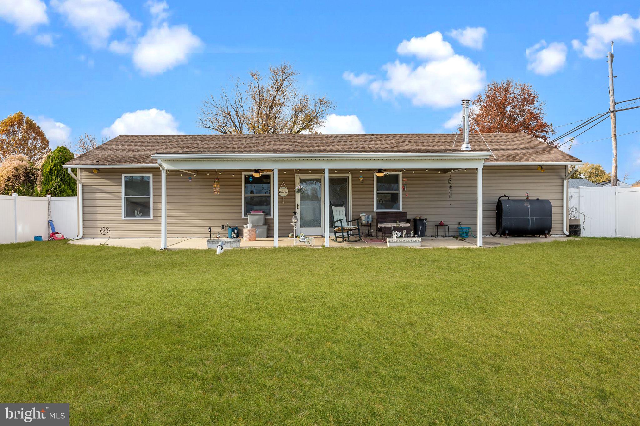 179 Crabtree Drive Levittown, PA 19055 - Photo 24 of 25 a view of a house with patio and a garden