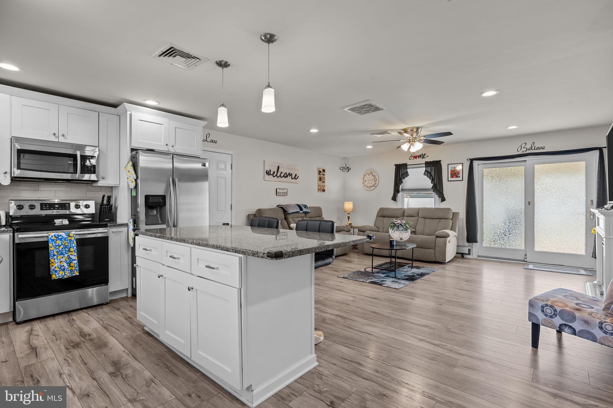 179 Crabtree Drive Levittown, PA 19055 - Photo 3 of 25 a kitchen with sink cabinets and stainless steel appliances