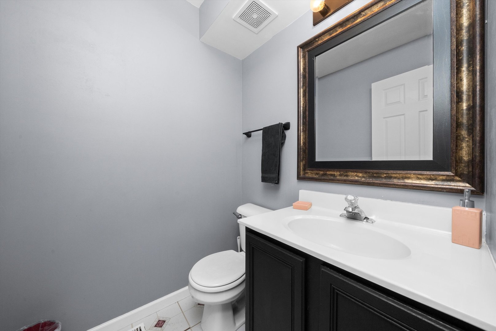 258 Silverado Street Bolingbrook, IL 60490 - Photo 16 of 31 a bathroom with a sink and a toilet