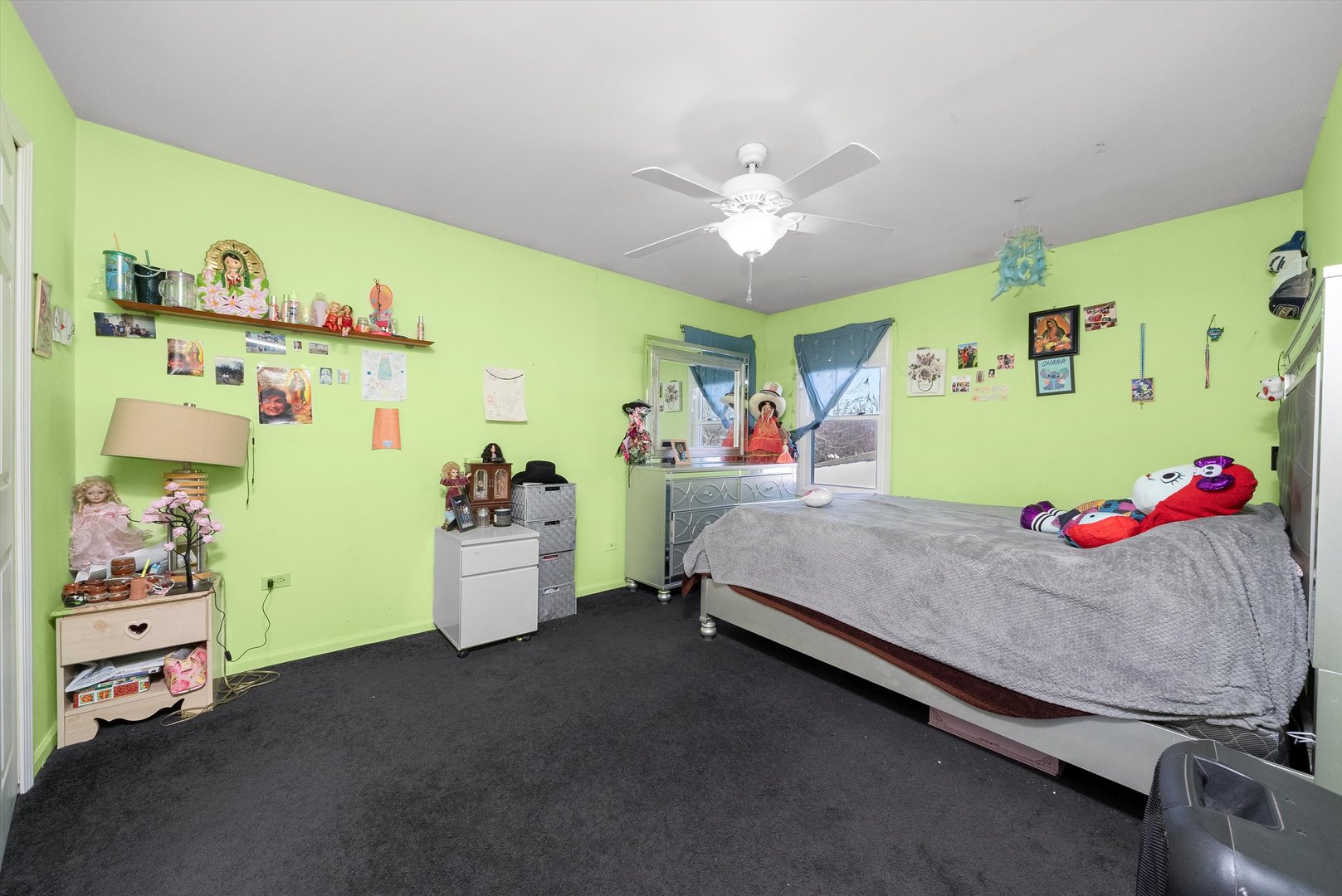 258 Silverado Street Bolingbrook, IL 60490 - Photo 23 of 31 a bed room with a bed and a baby bed