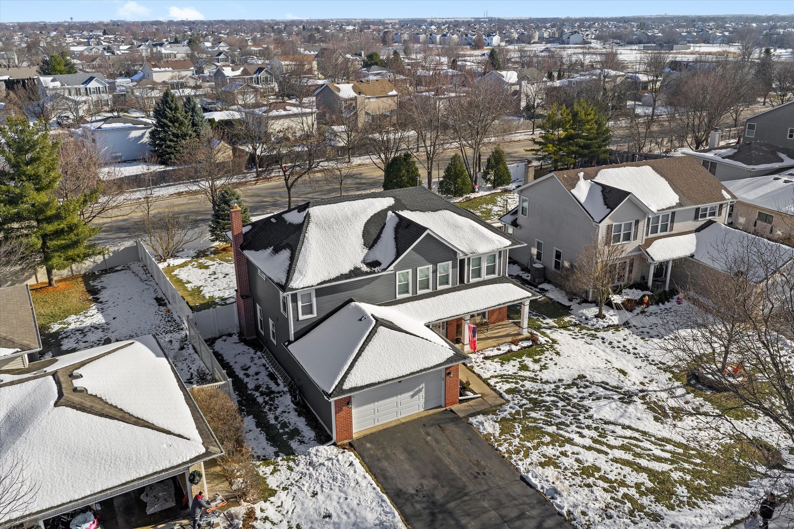 258 Silverado Street Bolingbrook, IL 60490 - Photo 3 of 31 an aerial view of a house with a yard and mountain view in back