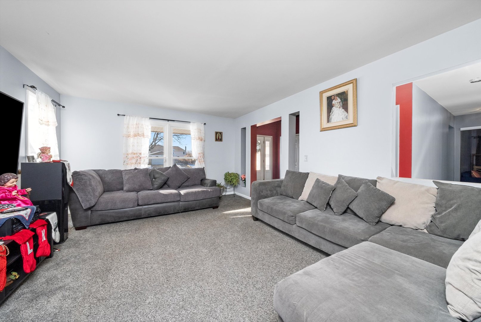 258 Silverado Street Bolingbrook, IL 60490 - Photo 6 of 31 a living room with furniture and a couch