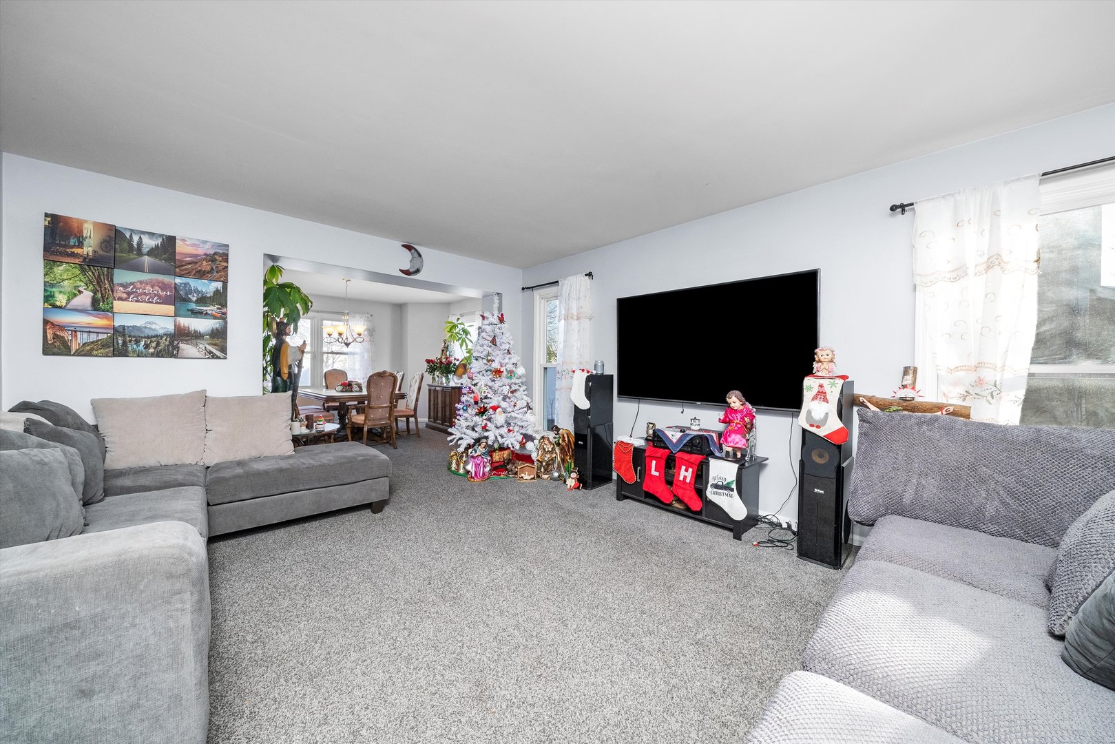 258 Silverado Street Bolingbrook, IL 60490 - Photo 7 of 31 a living room with furniture and a flat screen tv