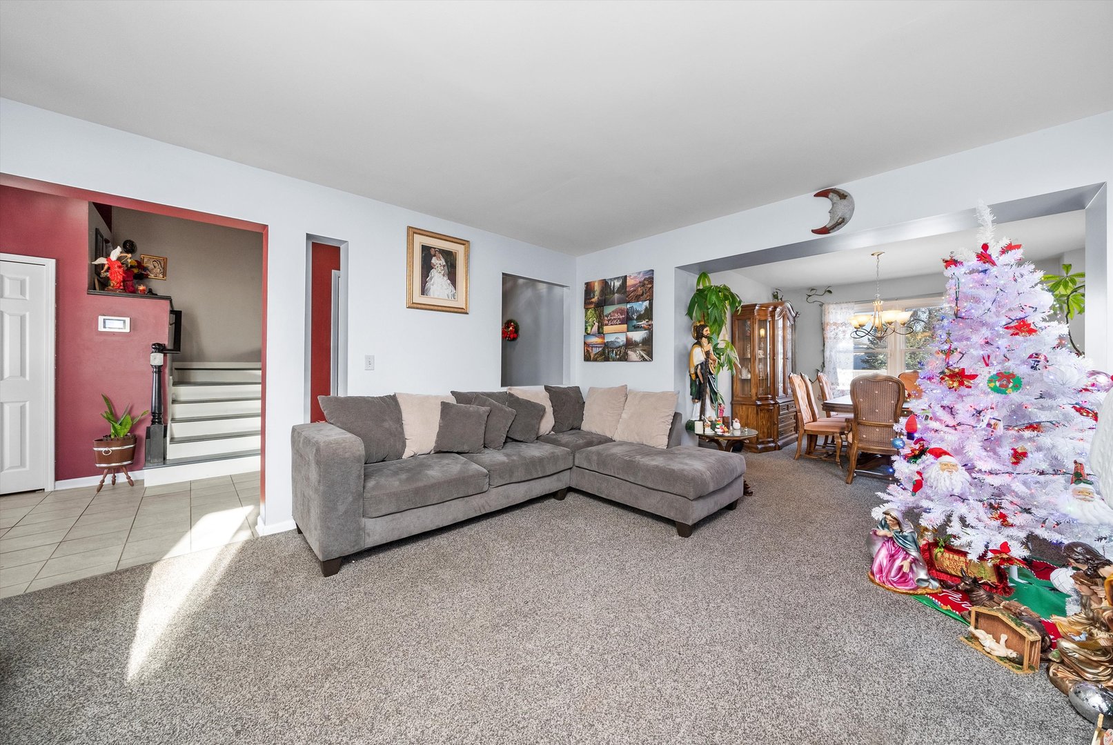 258 Silverado Street Bolingbrook, IL 60490 - Photo 8 of 31 a living room with furniture and a couch
