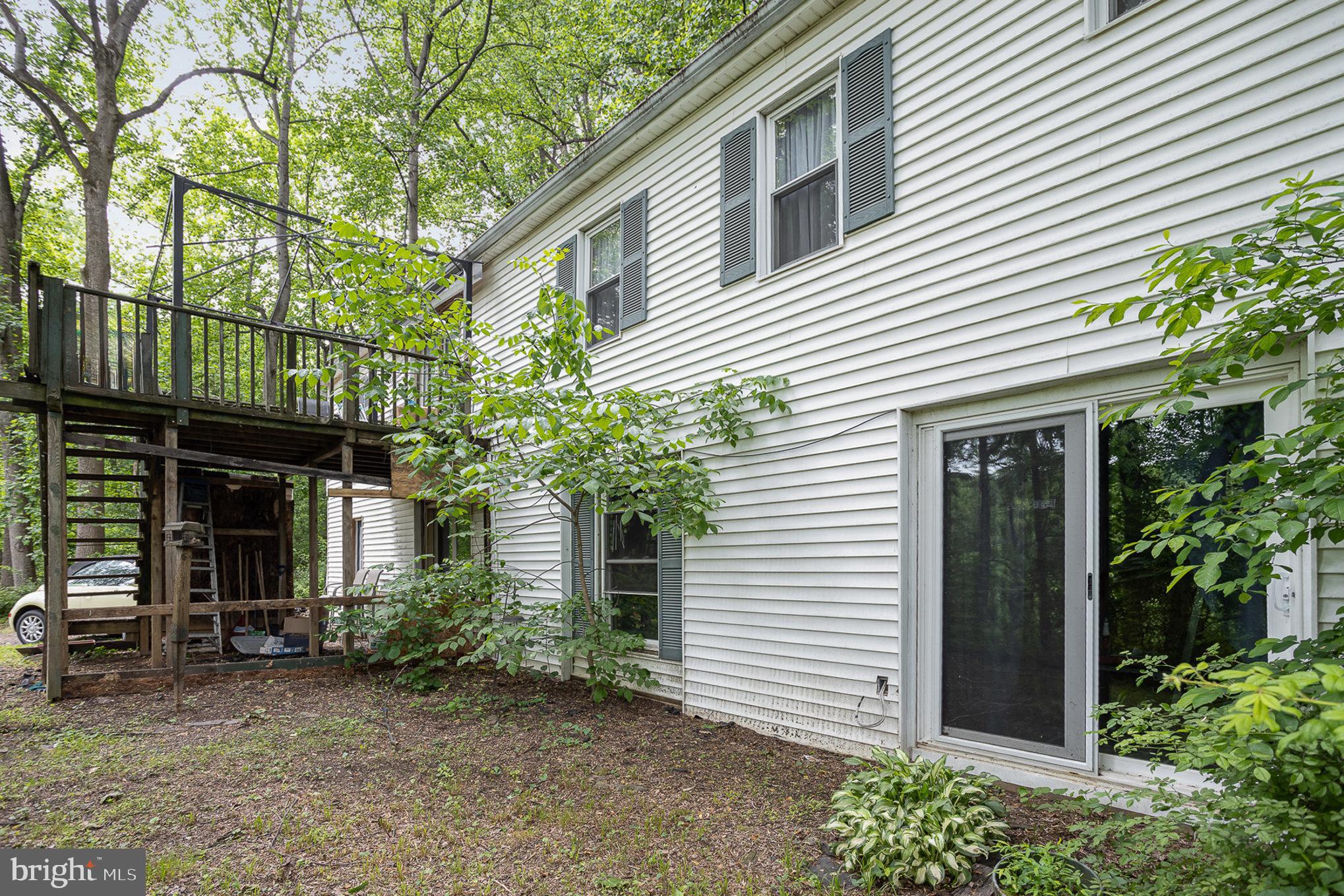 965 Pennsy Road Pequea, PA 17565 - Photo 3 of 24 a view of a house with a yard and plants