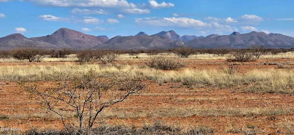 a view of lake with mountain