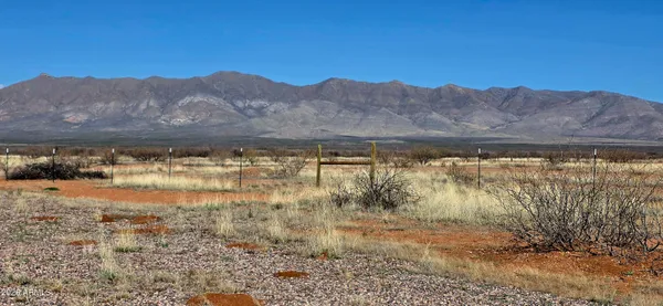 a view of lake with mountain