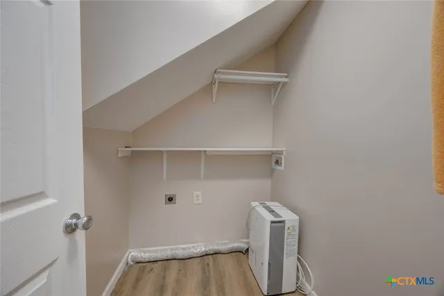 a bathroom with a sink a vanity and a mirror