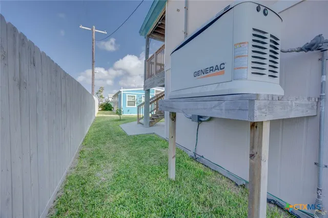 a backyard of a house with seating space
