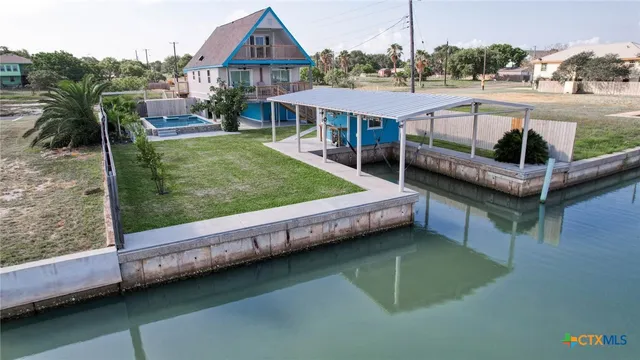 a view of a house with a swimming pool