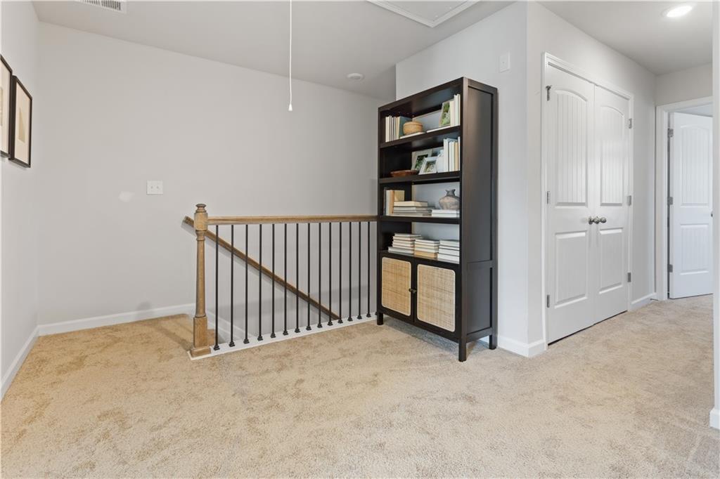 122 Meadowview Drive, Unit 11 Temple, GA 30179 - Photo 13 of 25 a view of a hallway with closet