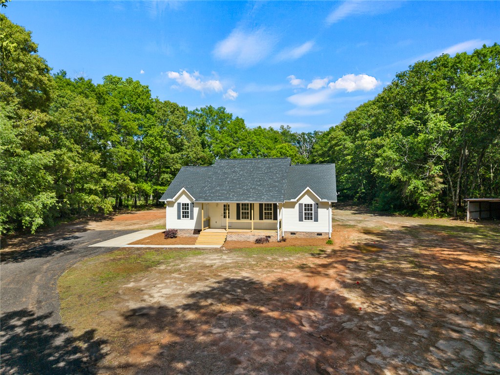 131 Lockaby Road Pelzer, SC 29669 - Photo 6 of 50 This inviting home offers a welcoming front porch!
