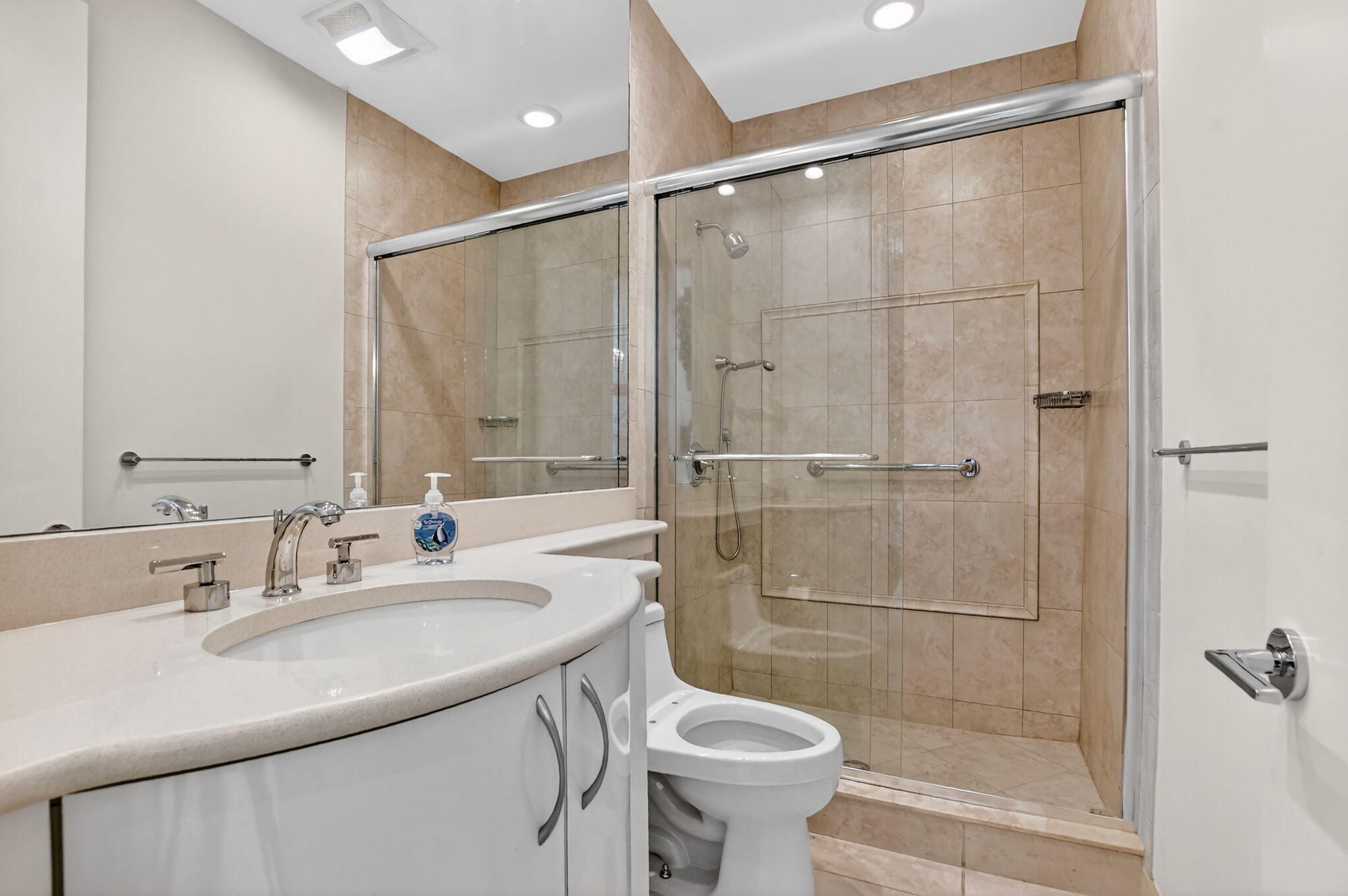 7567 Rexford Road Boca Raton, FL 33434 - Photo 16 of 95 a bathroom with a sink toilet and shower