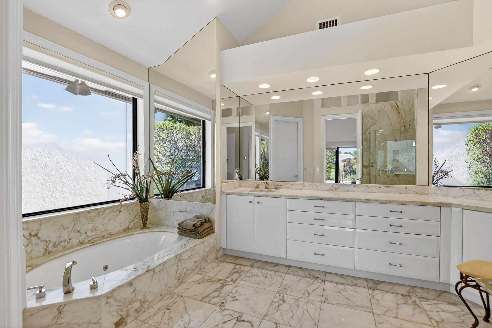 7567 Rexford Road Boca Raton, FL 33434 - Photo 31 of 95 a bathroom with a large tub sink and double vanity
