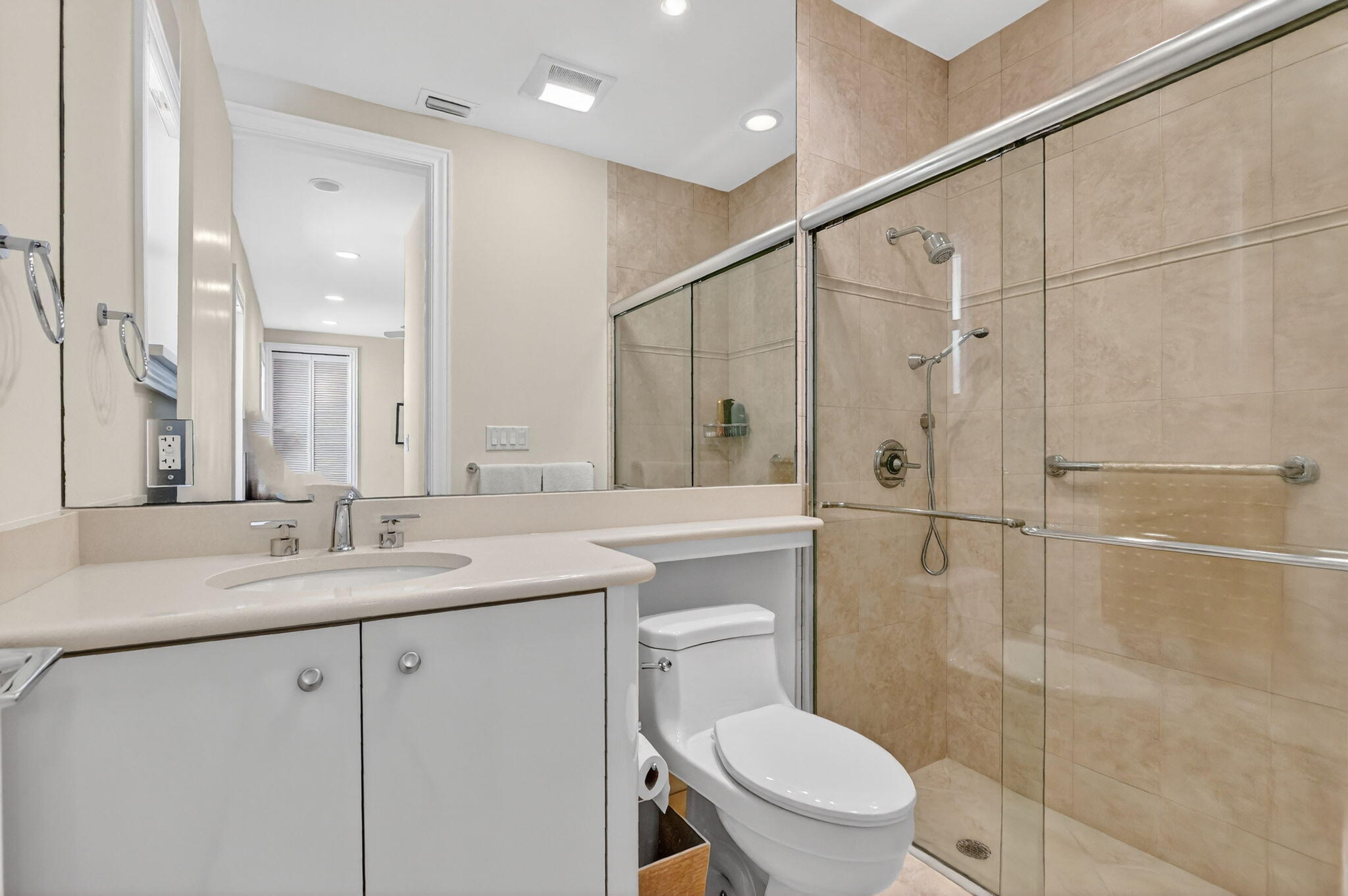 7567 Rexford Road Boca Raton, FL 33434 - Photo 40 of 95 a bathroom with a granite countertop sink toilet and shower