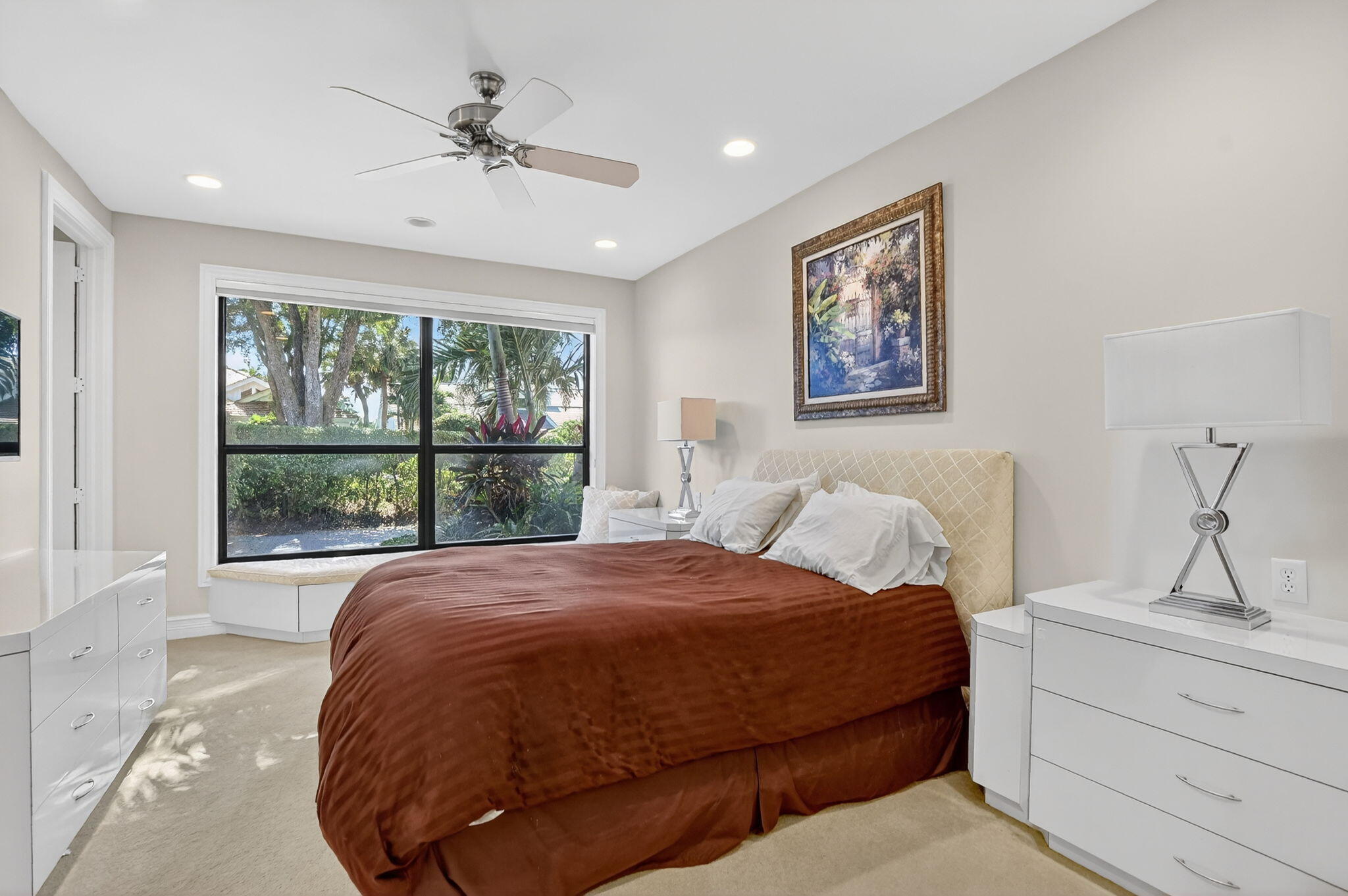 7567 Rexford Road Boca Raton, FL 33434 - Photo 43 of 95 a bedroom with a large bed and a window