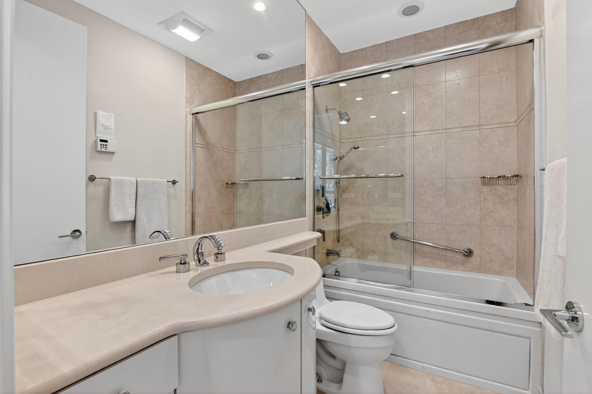 7567 Rexford Road Boca Raton, FL 33434 - Photo 46 of 95 a bathroom with a sink toilet and shower