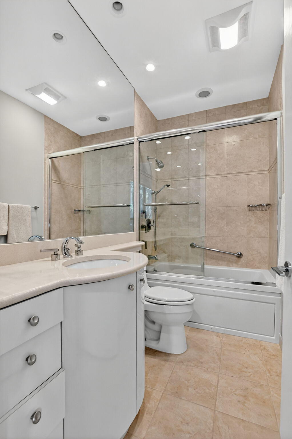 7567 Rexford Road Boca Raton, FL 33434 - Photo 47 of 95 a bathroom with a double vanity sink toilet and shower