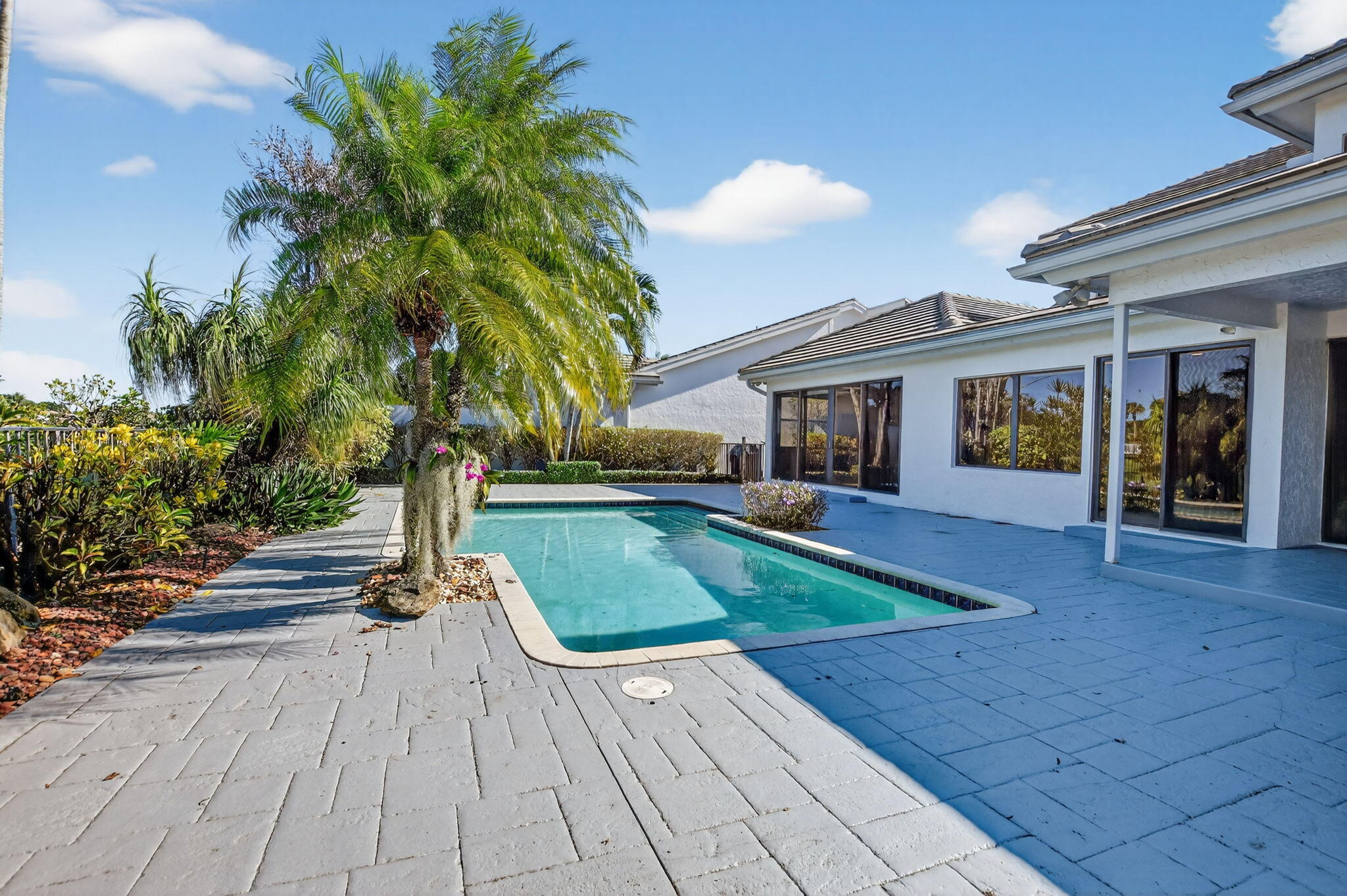 7567 Rexford Road Boca Raton, FL 33434 - Photo 55 of 95 a view of outdoor space yard deck and lake view
